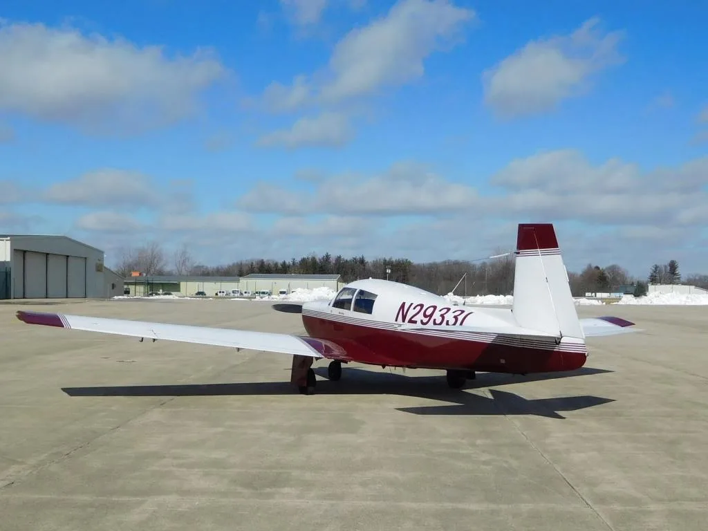Exterior view of a 1967 Mooney M20C - N2933L Aircraft.
