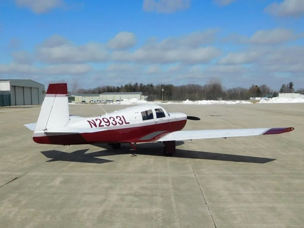 Exterior view of a 1967 Mooney M20C - N2933L Aircraft.