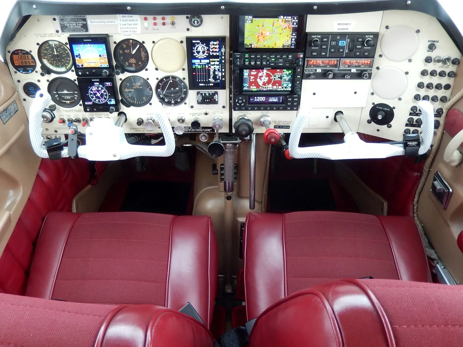 Cockpit and instrument panel of a 1968 Mooney M20 F- N3486N Aircraft.