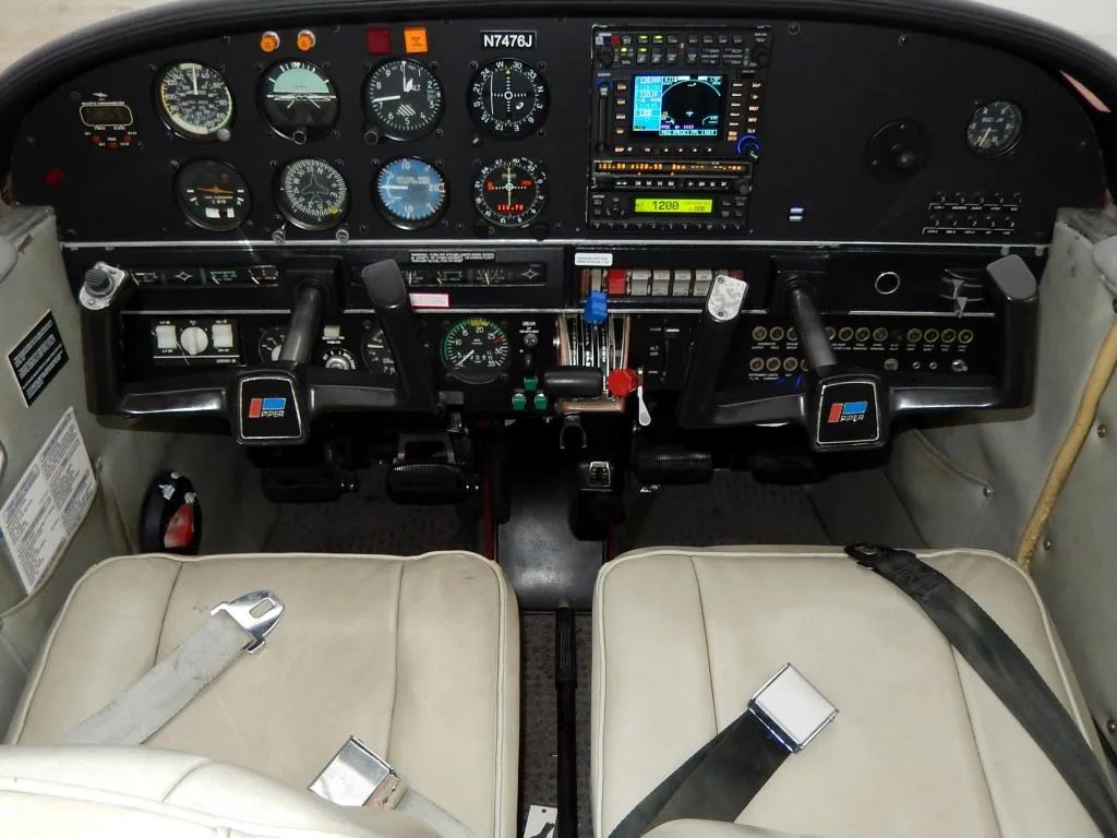 Cockpit and instrument panel of a 1968 Piper Arrow 180- N7476J Aircraft.
