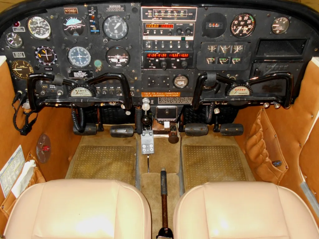 Cockpit and instrument panel of a 1968 Piper Cherokee- N7249J Aircraft.