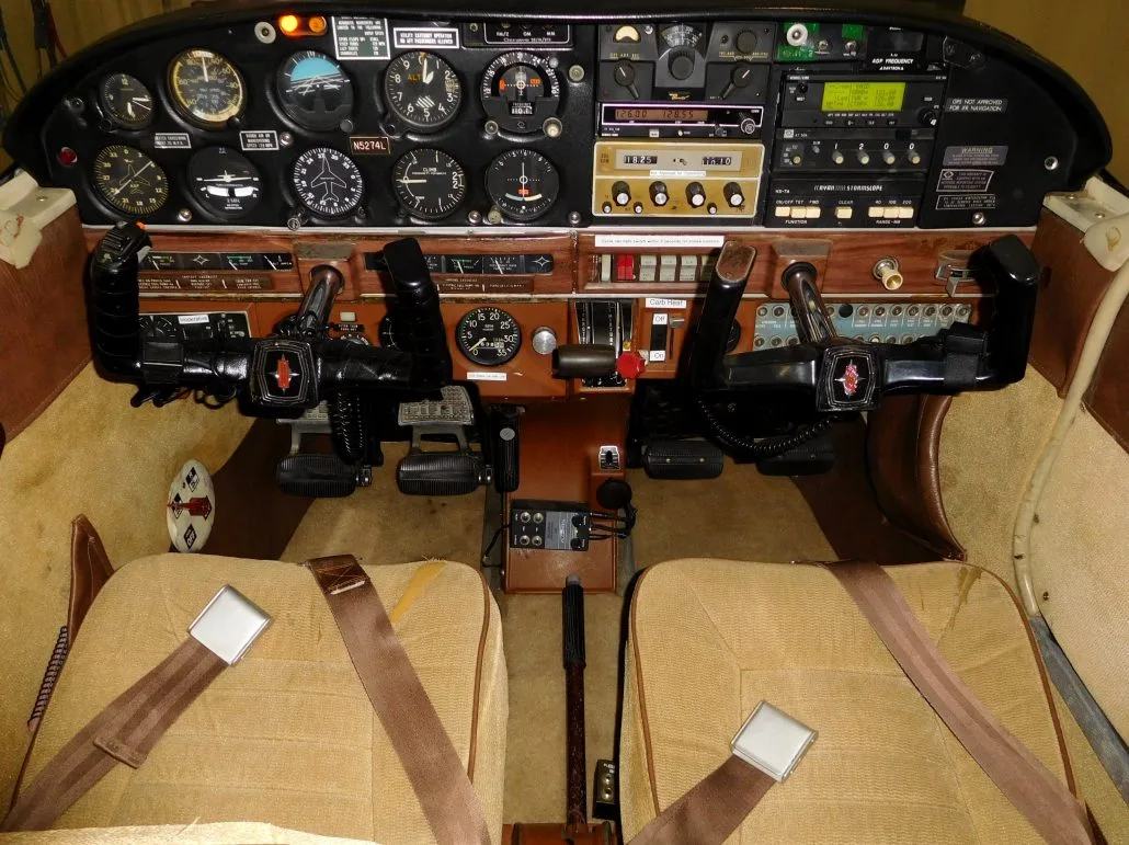 Cockpit and instrument panel of a 1968 Piper Cherokee 180D - N5274L Aircraft.