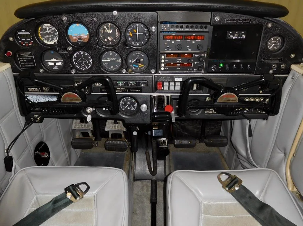 Cockpit and instrument panel of a 1970 Piper Cherokee - N6003U Aircraft.