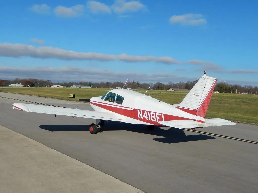 Exterior view of a 1971 Piper Cherokee 140- N418FL Aircraft.