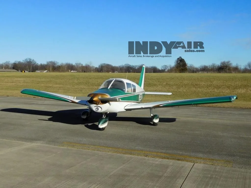 Exterior view of a 1971 Piper Cherokee 140 - N597W Aircraft.
