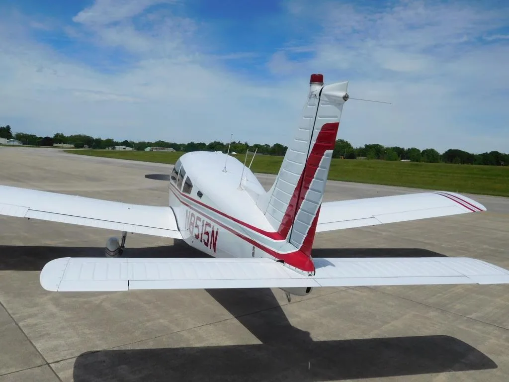 Exterior view of a 1973 Piper Ccherokee 180 Challenger - N8515N Aircraft.