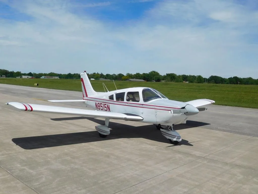 Exterior view of a 1973 Piper Ccherokee 180 Challenger - N8515N Aircraft.