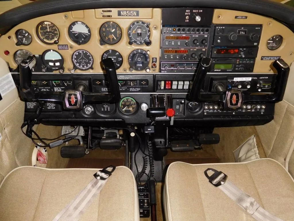 Cockpit and instrument panel of a 1973 Piper Ccherokee 180 Challenger - N8515N Aircraft.