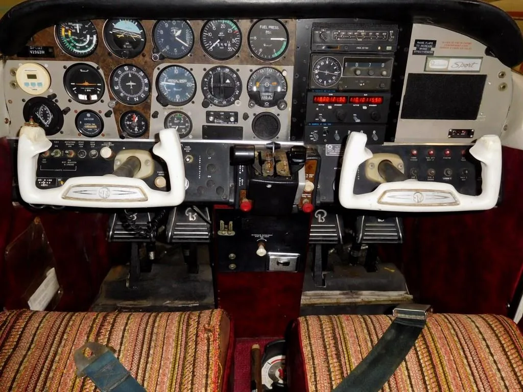 Cockpit and instrument panel of a 1974 Beech Sport - N1963W Aircraft.