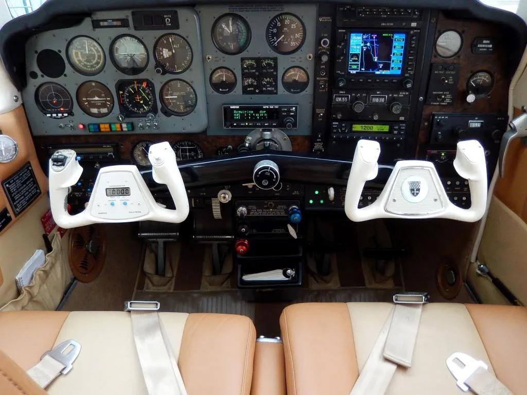 Cockpit and instrument panel of a 1975 Beechcraft F33A - N1HH Aircraft.