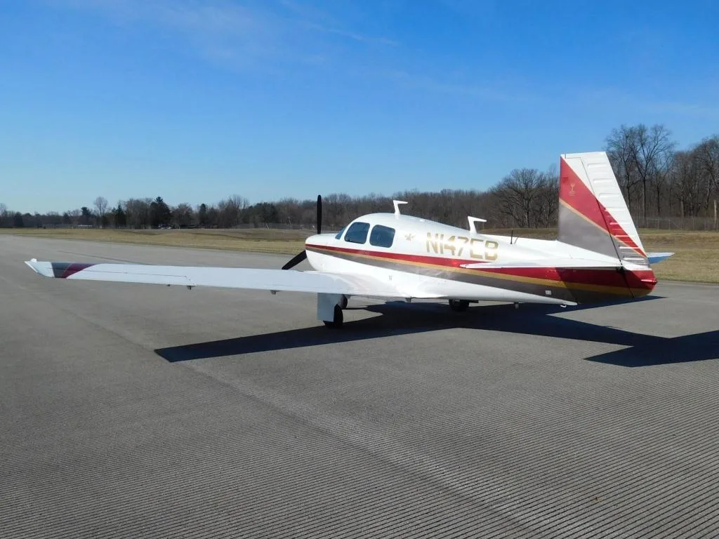 Exterior view of a 1975 Mooney M20C - N147EB Aircraft.