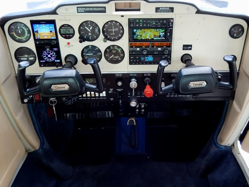 Cockpit and instrument panel of a 1977 Cessna 150M- N714CE Aircraft.