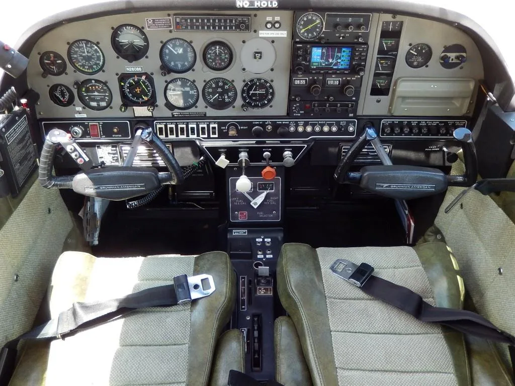 Cockpit and instrument panel of a 1977 Grumman Cheetah- N26086 Aircraft.