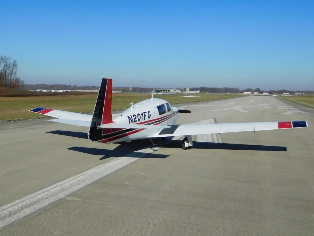 Exterior view of a 1977 Mooney M20J- N201FG Aircraft.