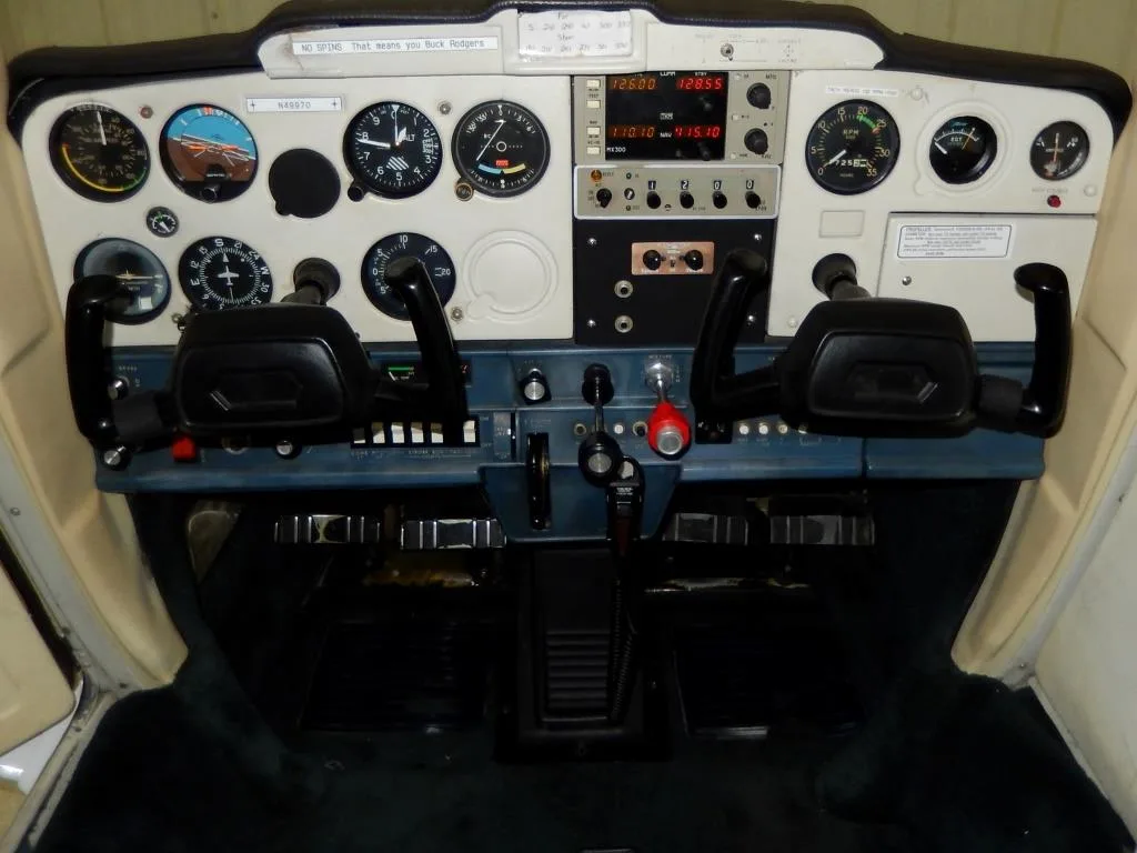 Cockpit and instrument panel of a 1978 Cessna 152- N49970 Aircraft.