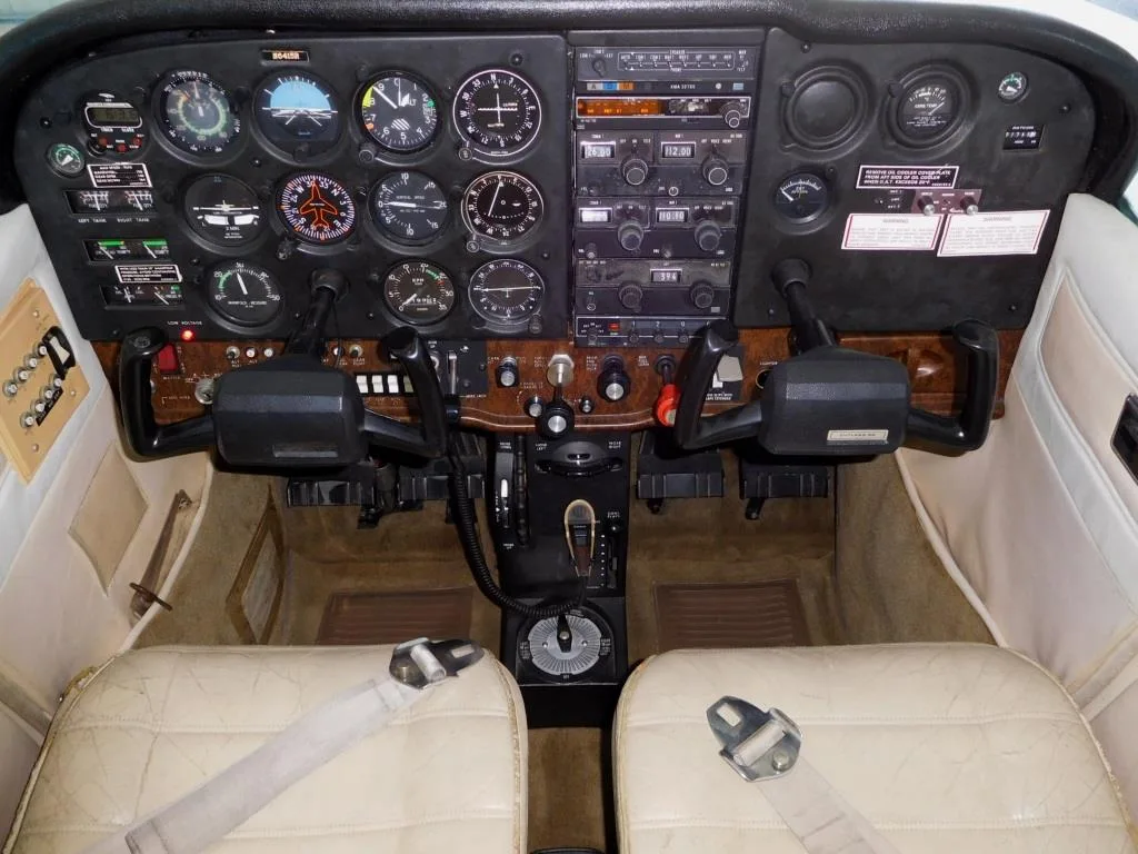 Cockpit and instrument panel of a 1980 Cessna 172 Cutlass - N6415R Aircraft.