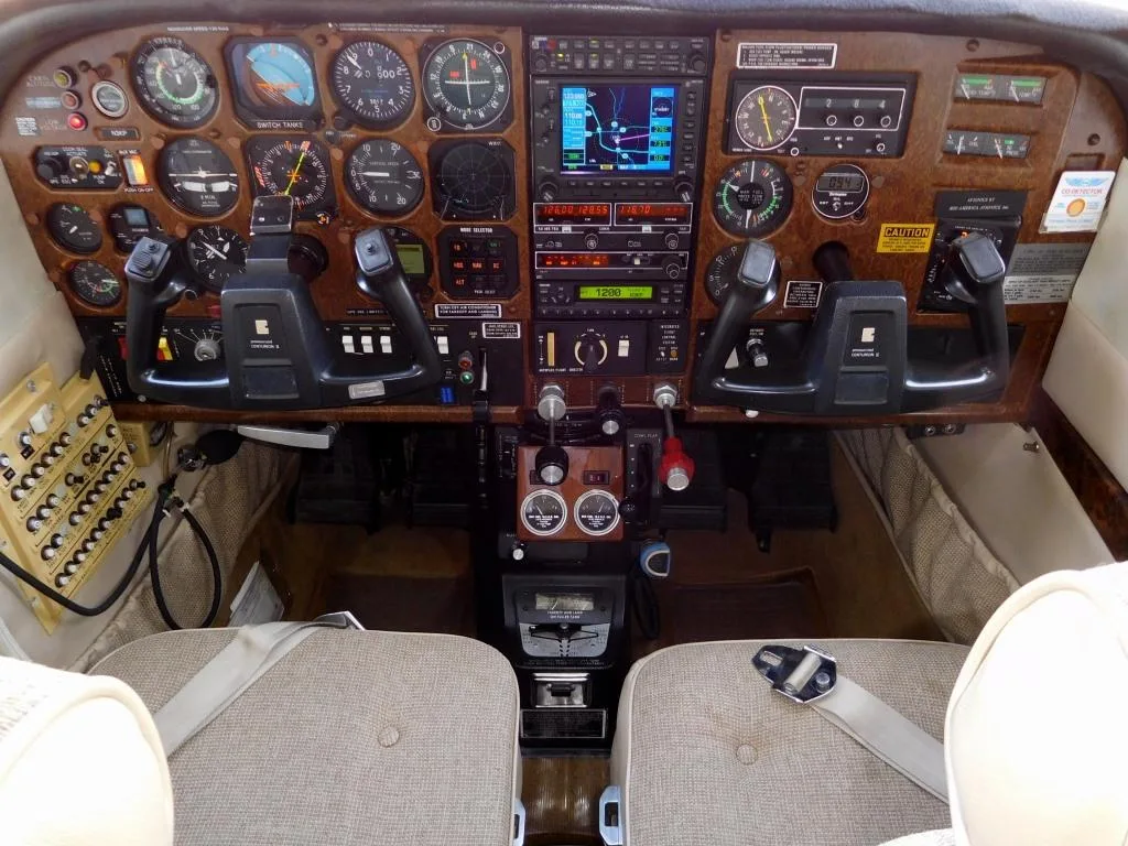 Cockpit and instrument panel of a 1981 Cessna P210 - N3KP Aircraft.