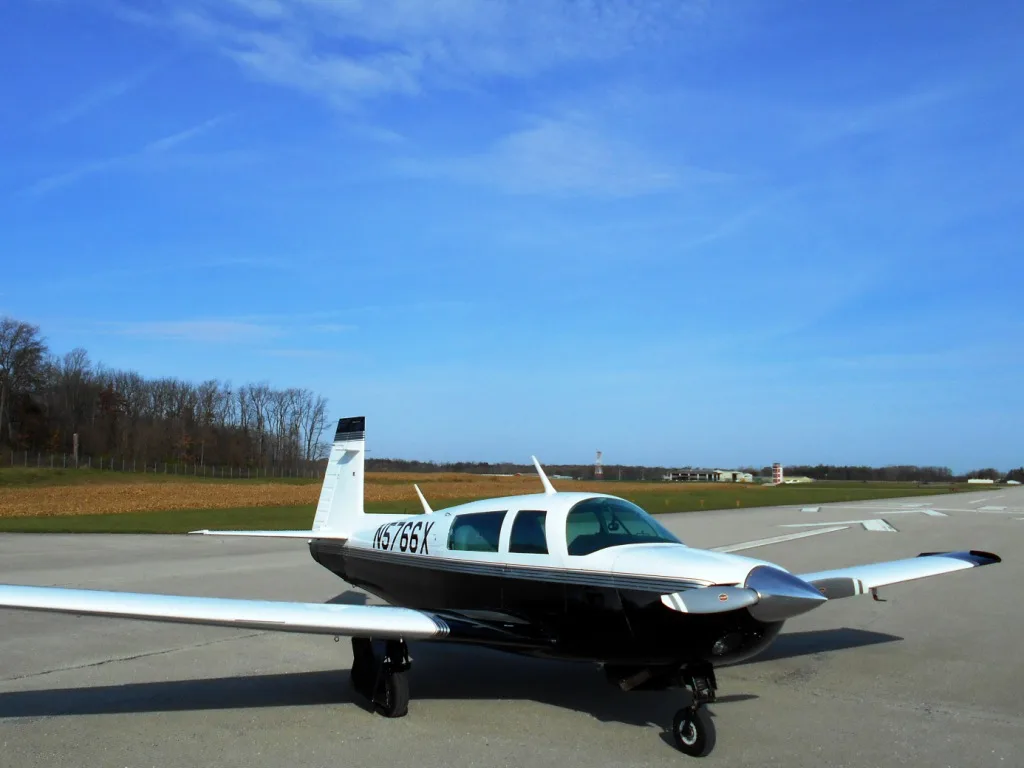 Exterior view of a 1984 Mooney m20j n5766x.