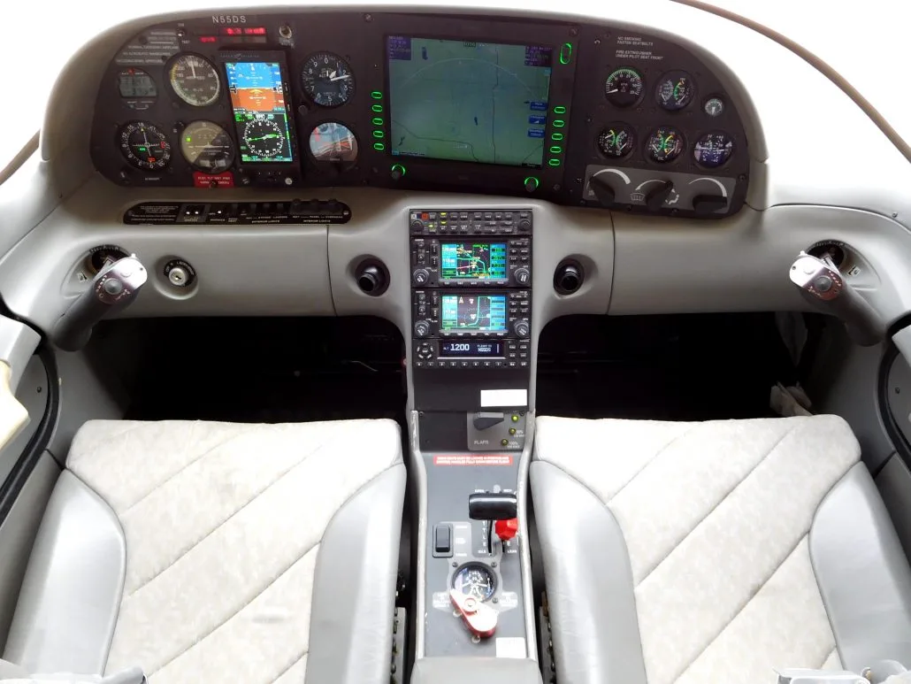 Cockpit and instrument panel of a 1999 Cirrus SR20 - N55DS Aircraft.