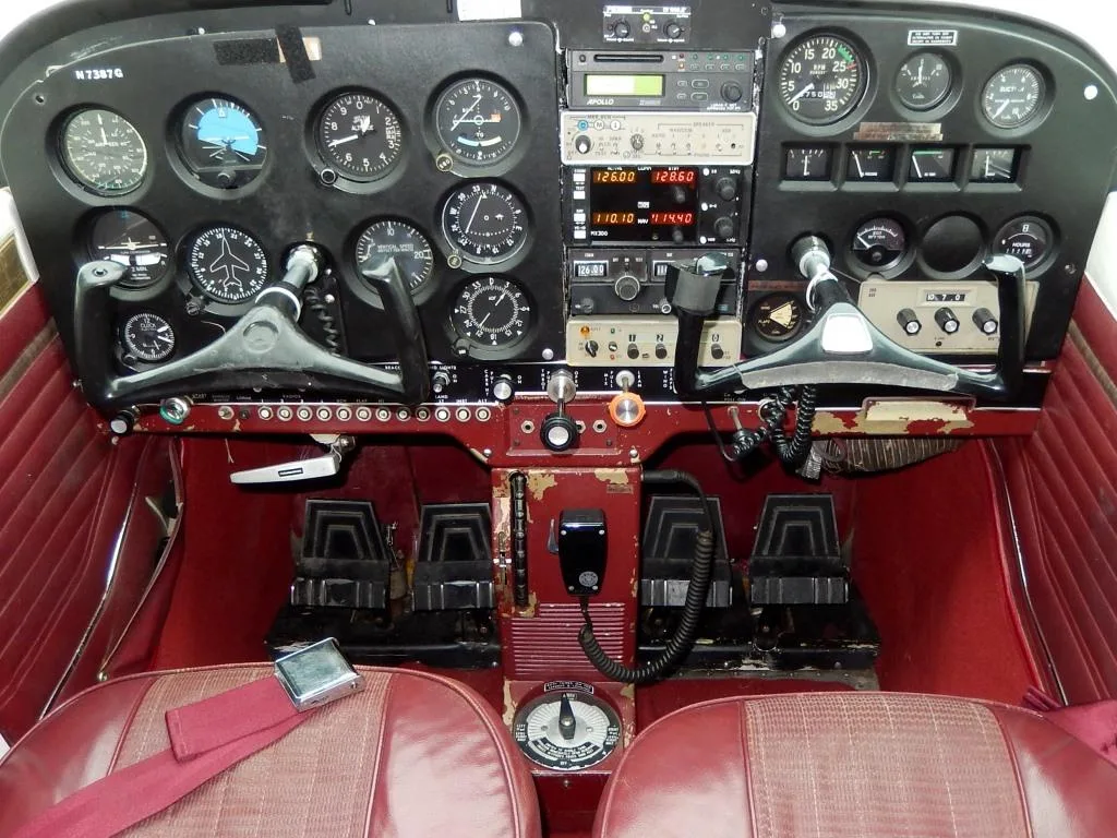 Cockpit and instrument panel of a 1970 Cessna 172 - N7387G Aircraft.