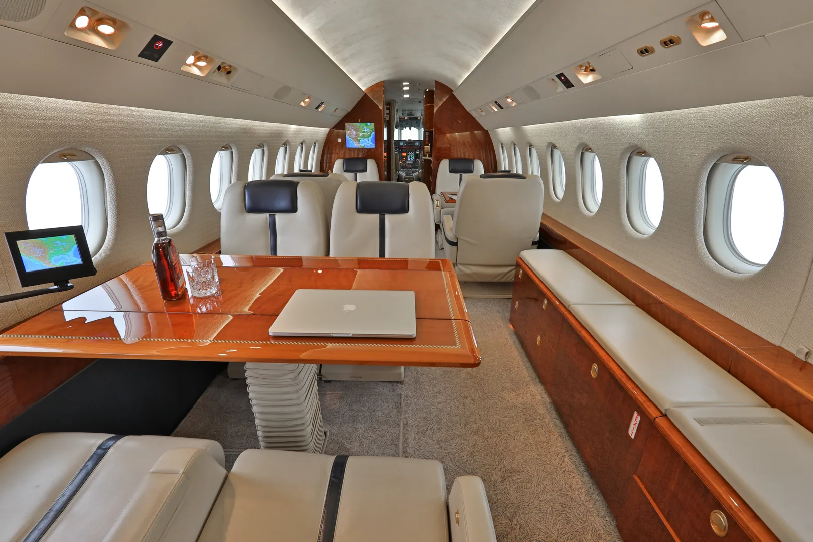 Cabin interior of a 2002 Dassault Falcon 900EX.