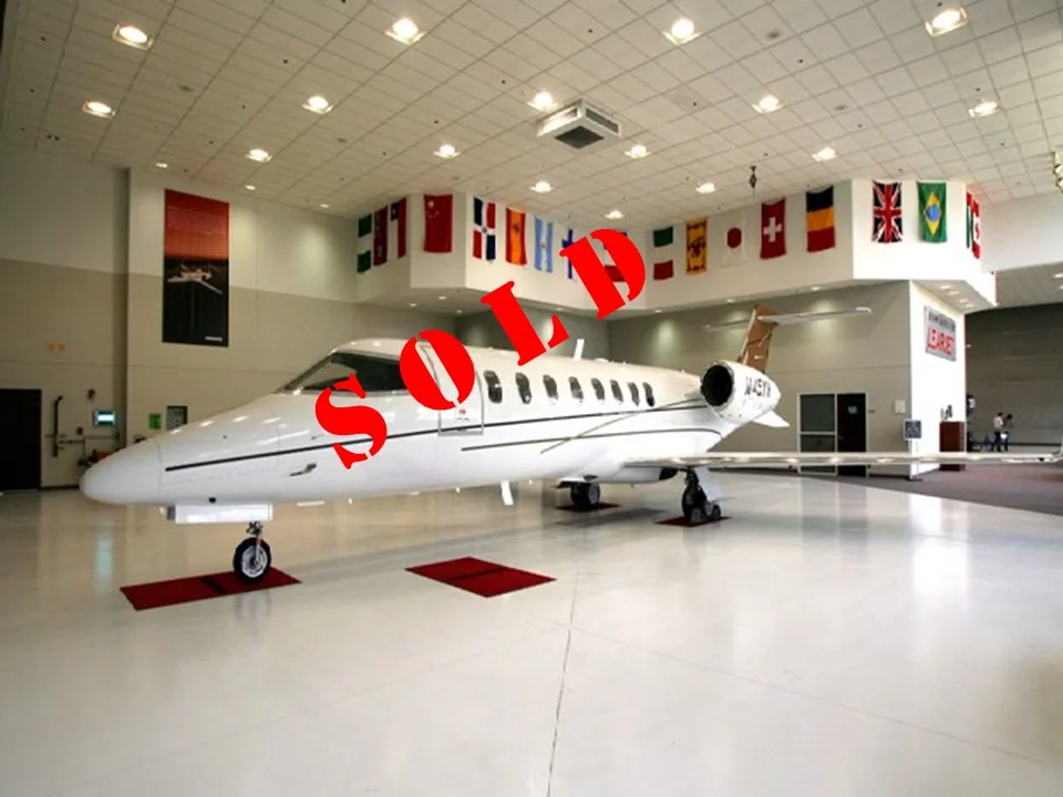 Exterior view of a 2007 Piper Arrow III PA28R-201, N228TX.