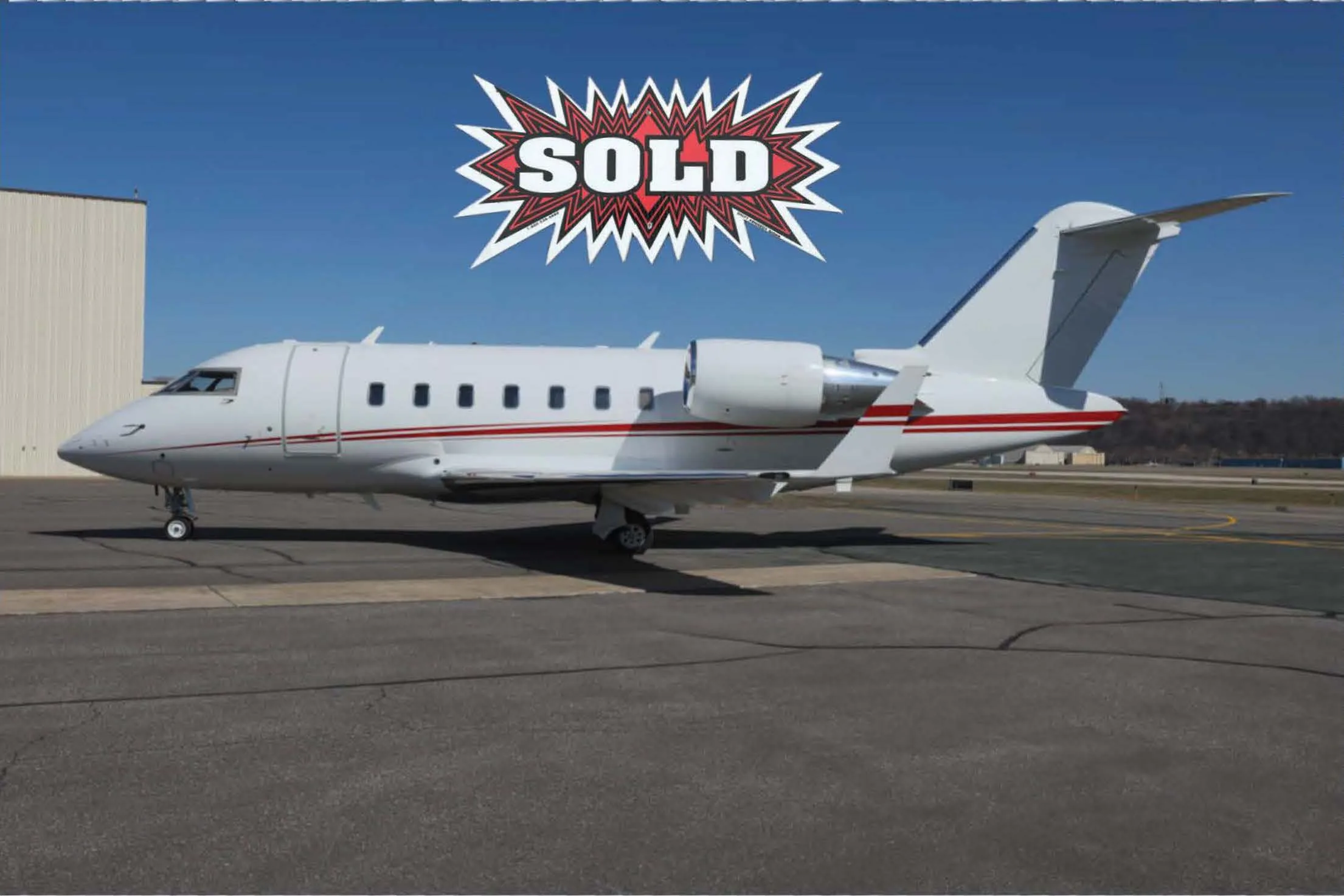 Exterior view of a 2012 Bombardier Challenger 605, N207R.