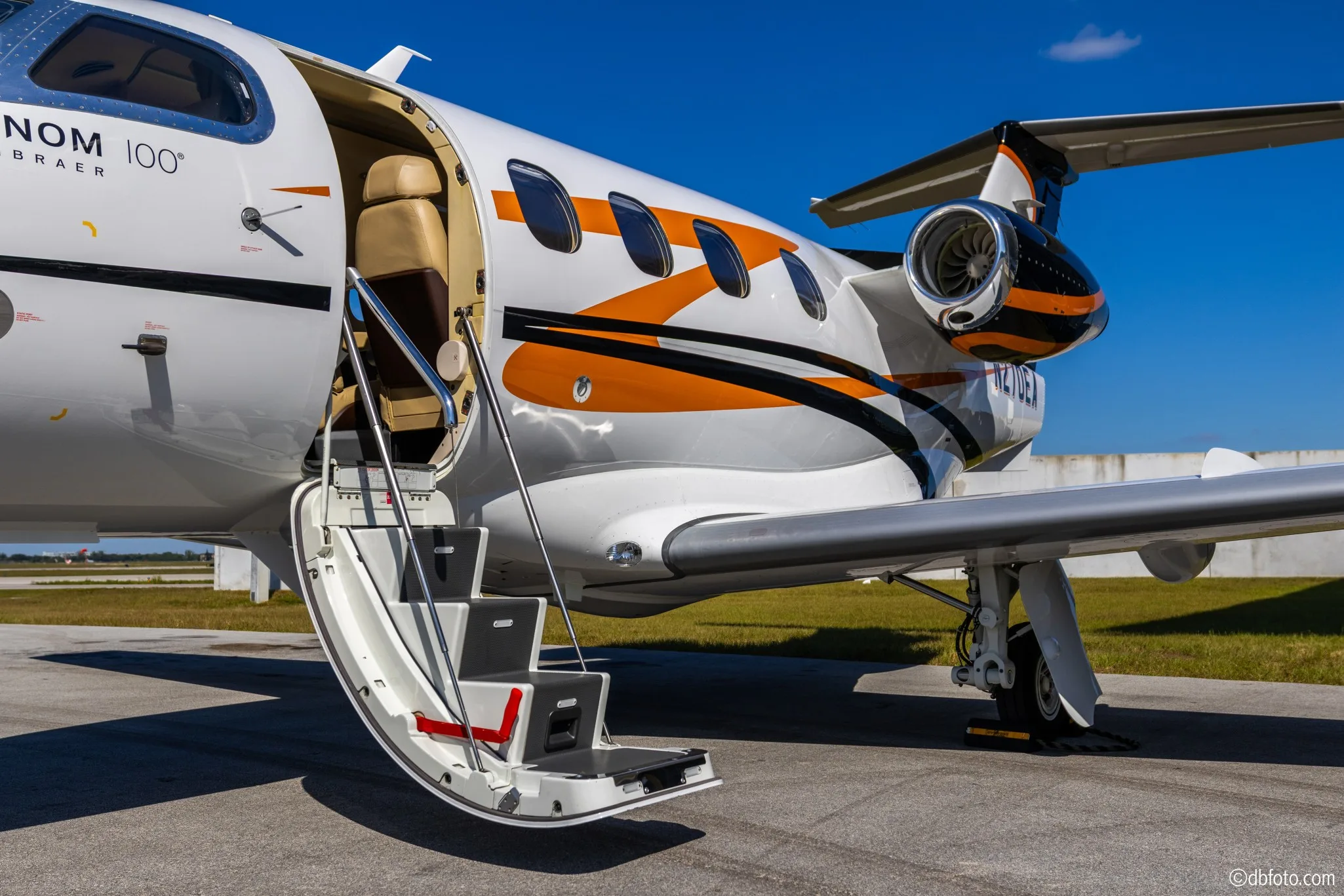 Exterior view of a 2012 Embraer Phenom 100, N270EA.