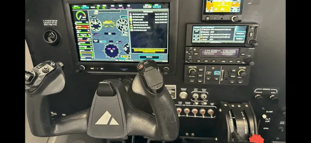 Cockpit and instrument panel of a 2020 Piper 100i PILOT.