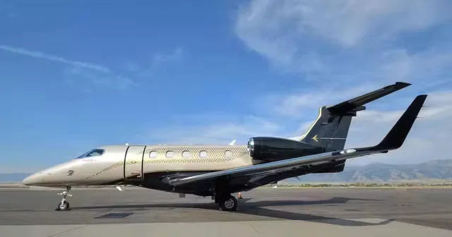 Exterior view of a 2020 Embraer Phenom 300.