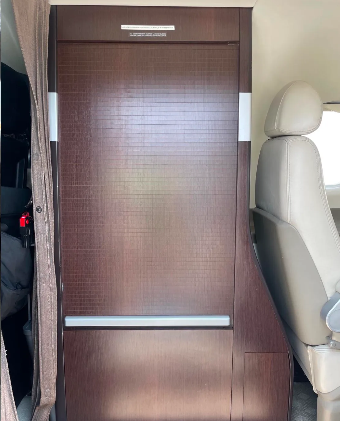 Cabin interior of a Embraer Phenom 100.