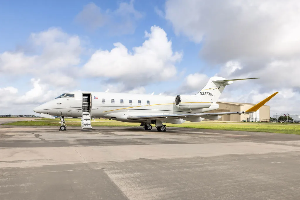 Exterior view of a 2018 Bombardier Challenger 350, N365MG.