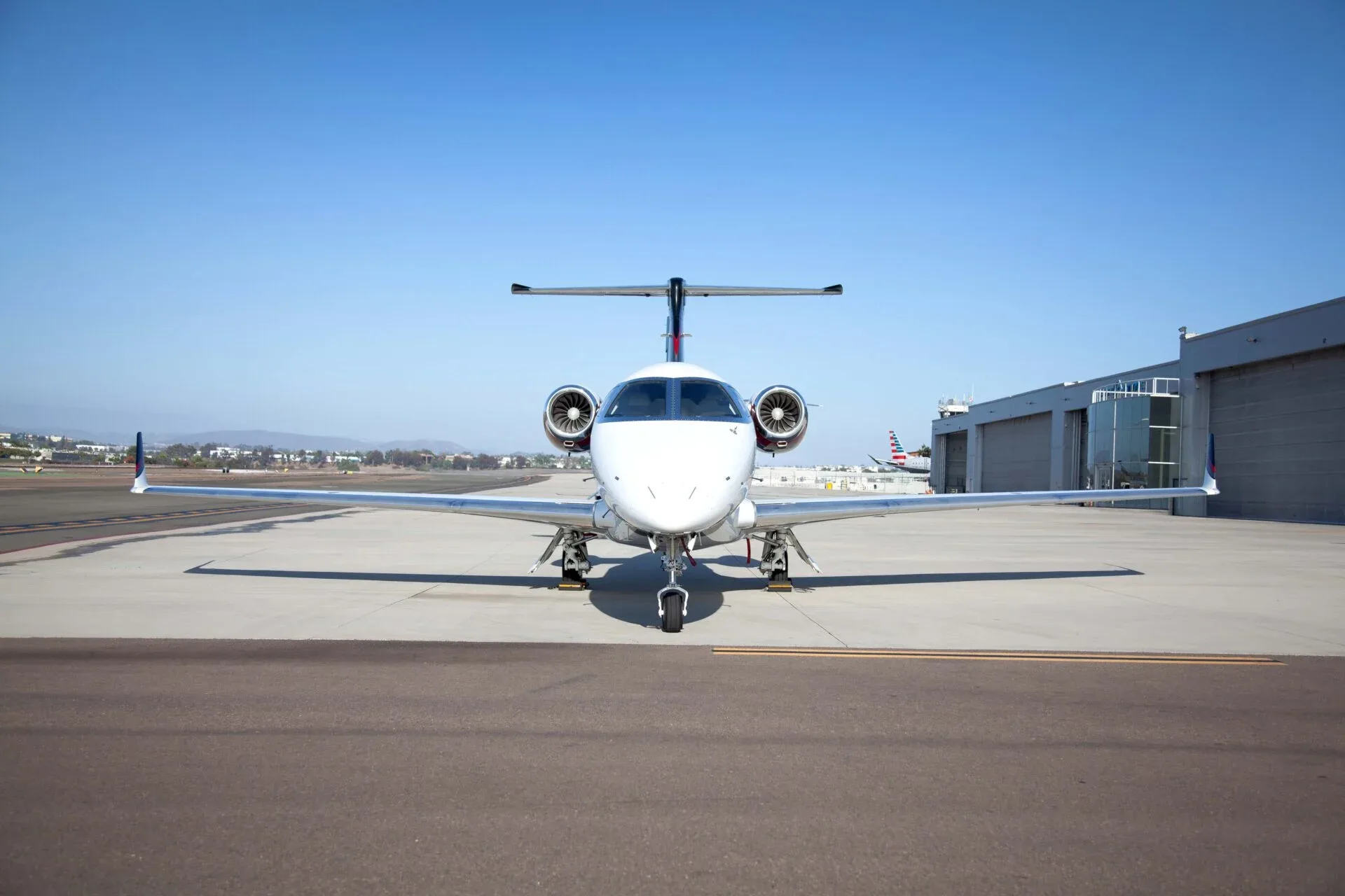 Exterior view of a 2017 Embraer Phenom 300.