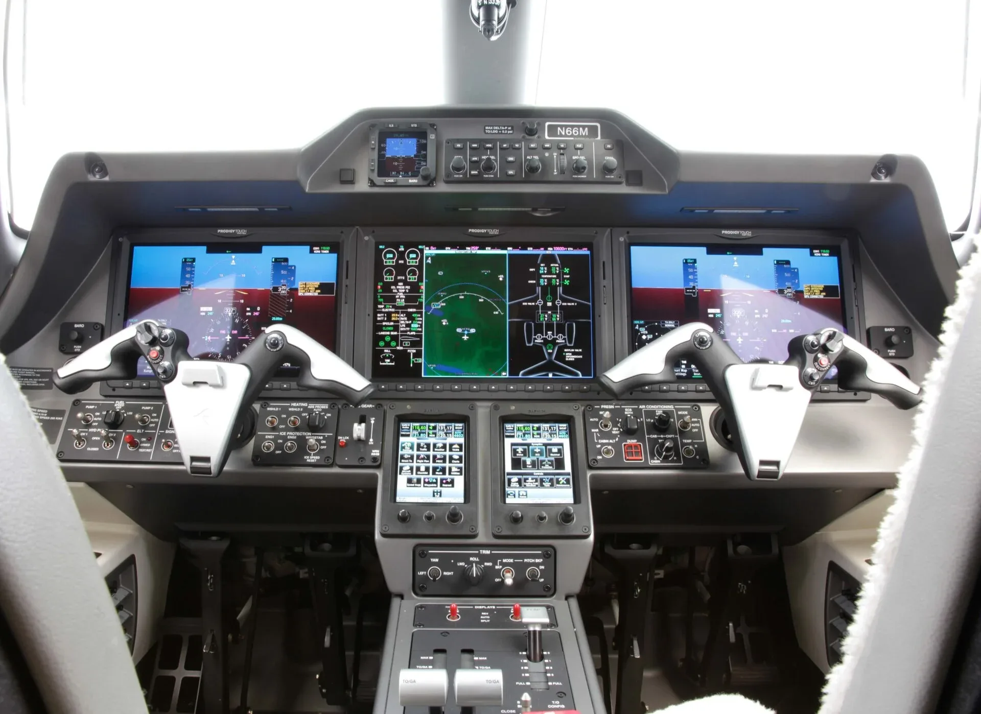 Cockpit and instrument panel of a 2017 Embraer Phenom 300.