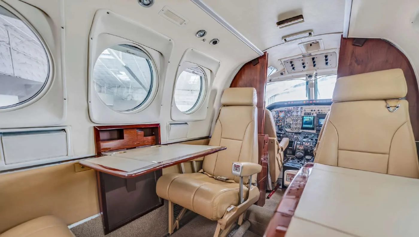 Cabin interior of a 1980 Beechcraft KING AIR C90 | Leviate Air Group.