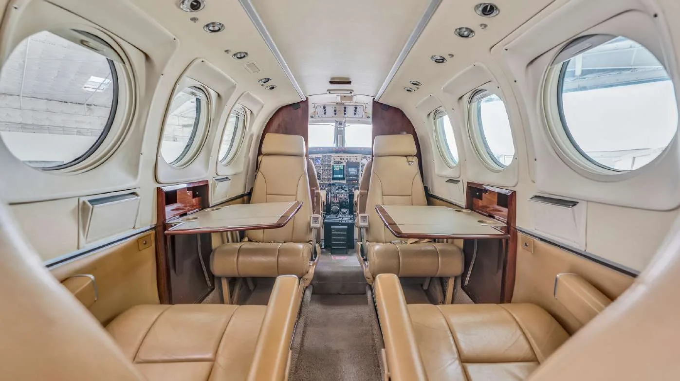 Cabin interior of a 1980 Beechcraft KING AIR C90 | Leviate Air Group.