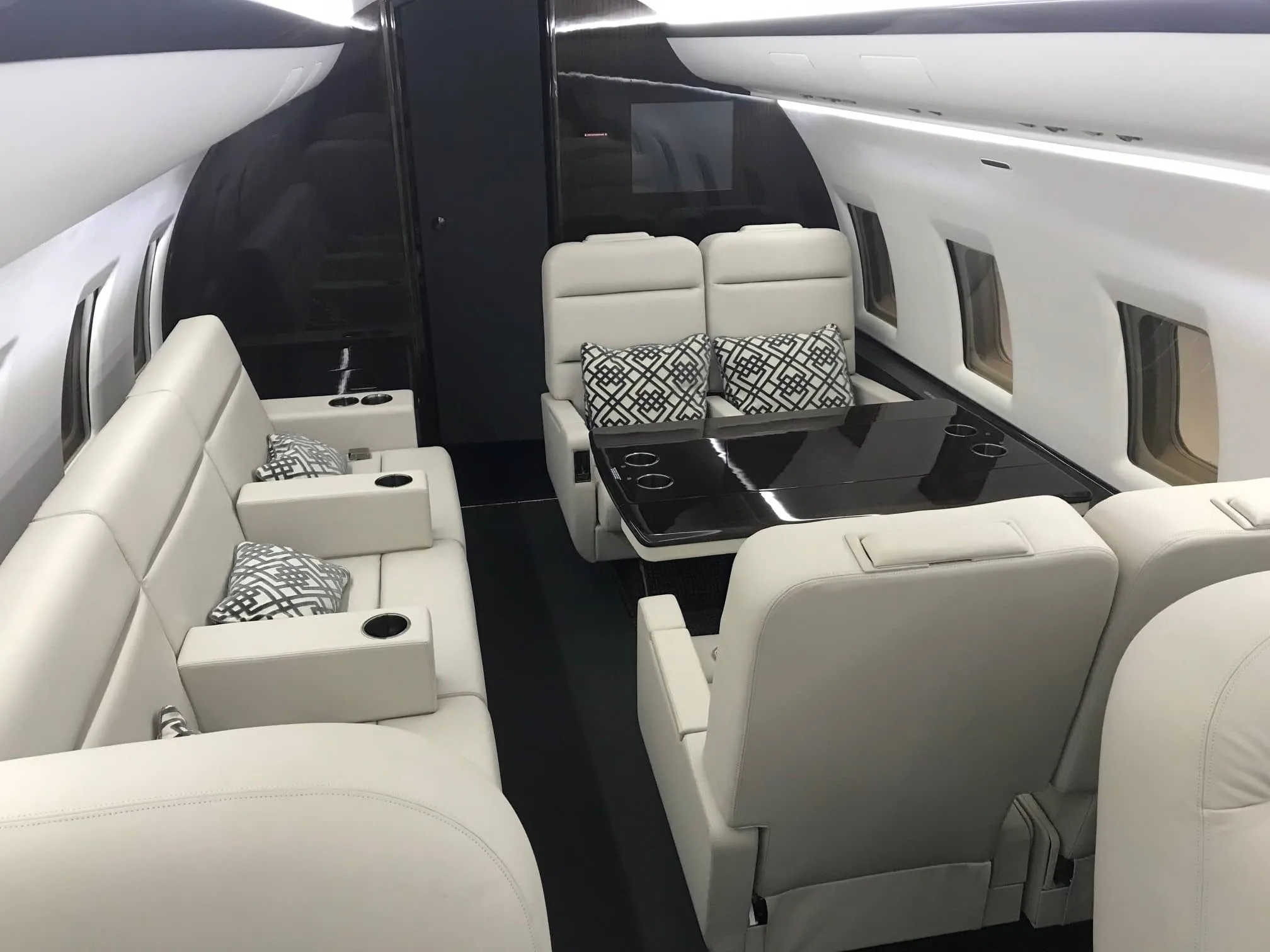 Cabin interior of a 2000 Bombardier Challenger 604 | Leviate Air Group.