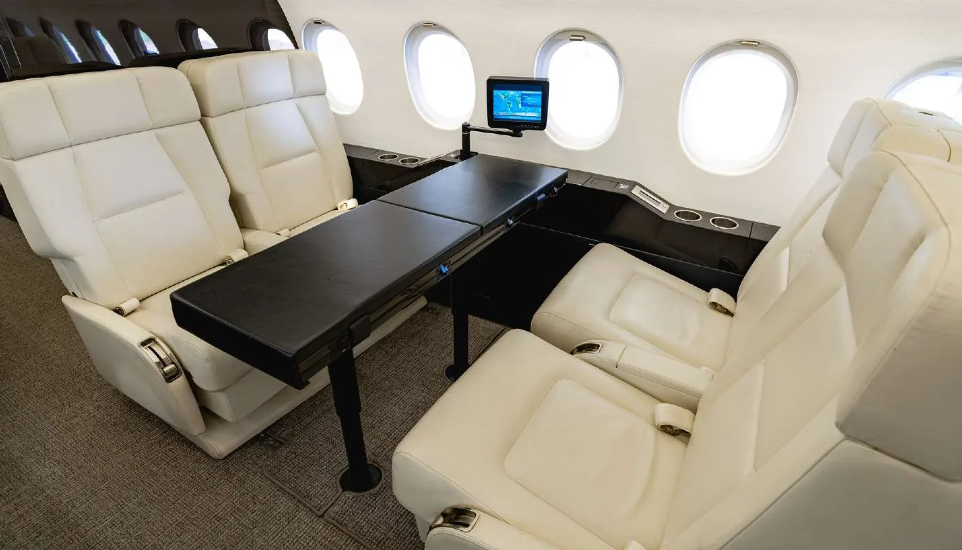 Cabin interior of a 2010 Dassault Falcon 900EX EASY SN 219 | Leviate Air Group.