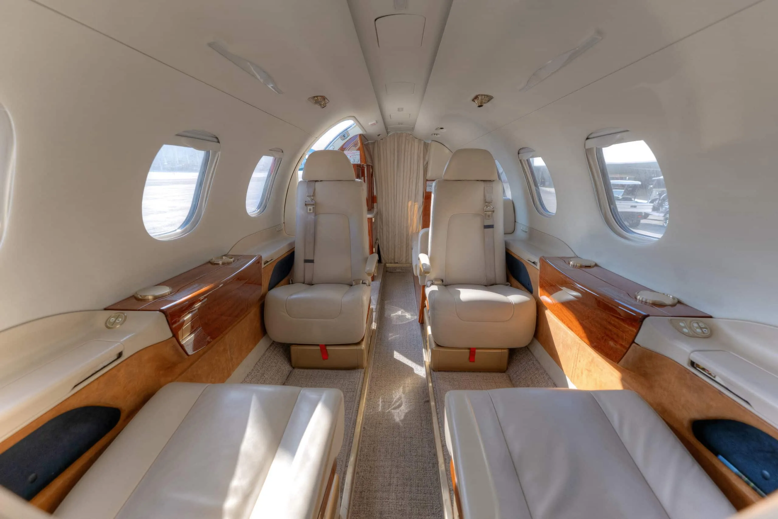 Cabin interior of a 2015 Embraer PHENOM 300 | Leviate Air Group.