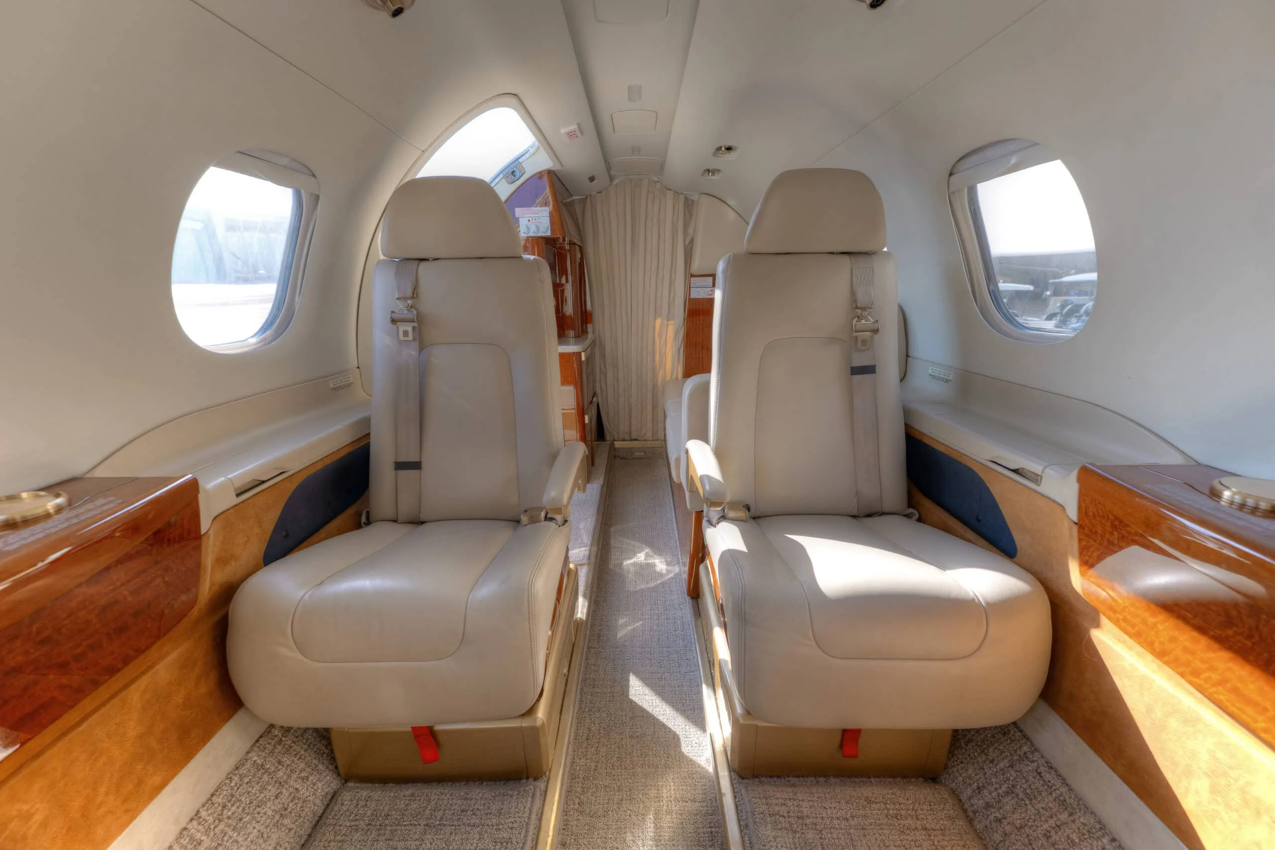 Cabin interior of a 2015 Embraer PHENOM 300 | Leviate Air Group.