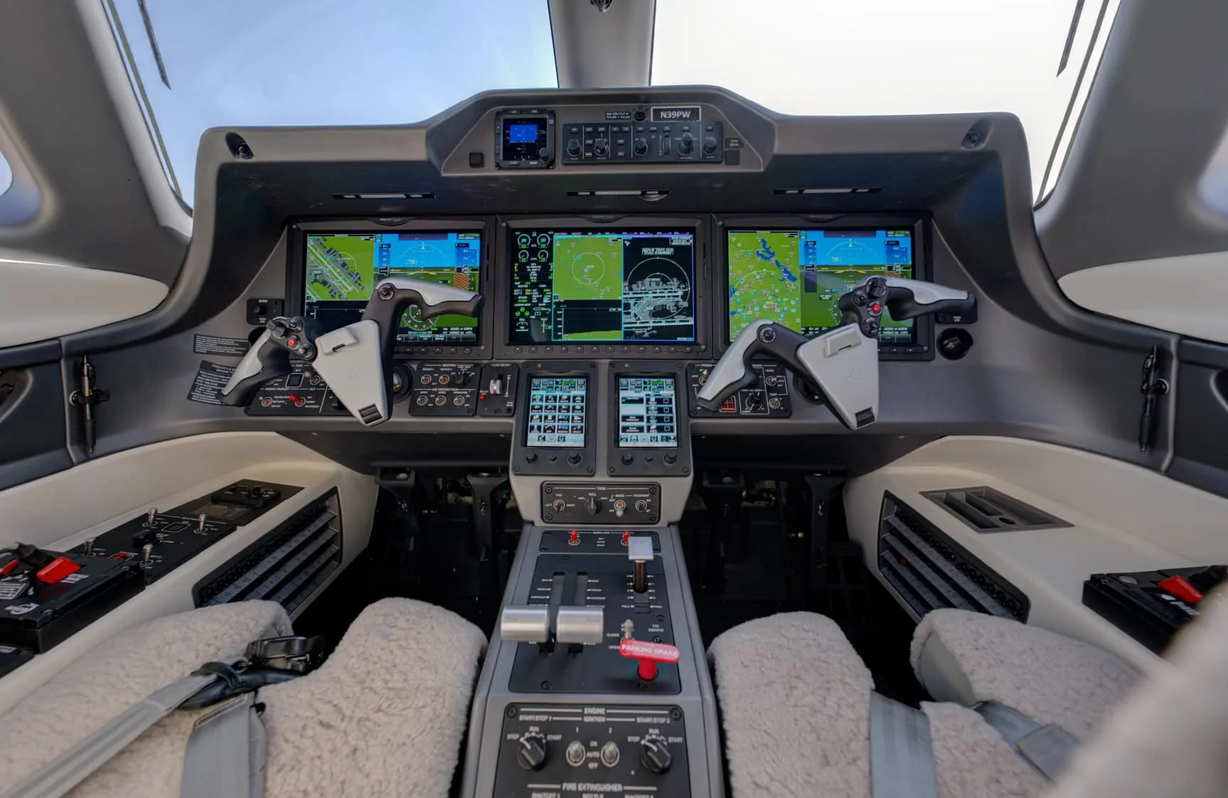 Cockpit and instrument panel of a 2023 Embraer PHENOM 100EV | Leviate Air Group.