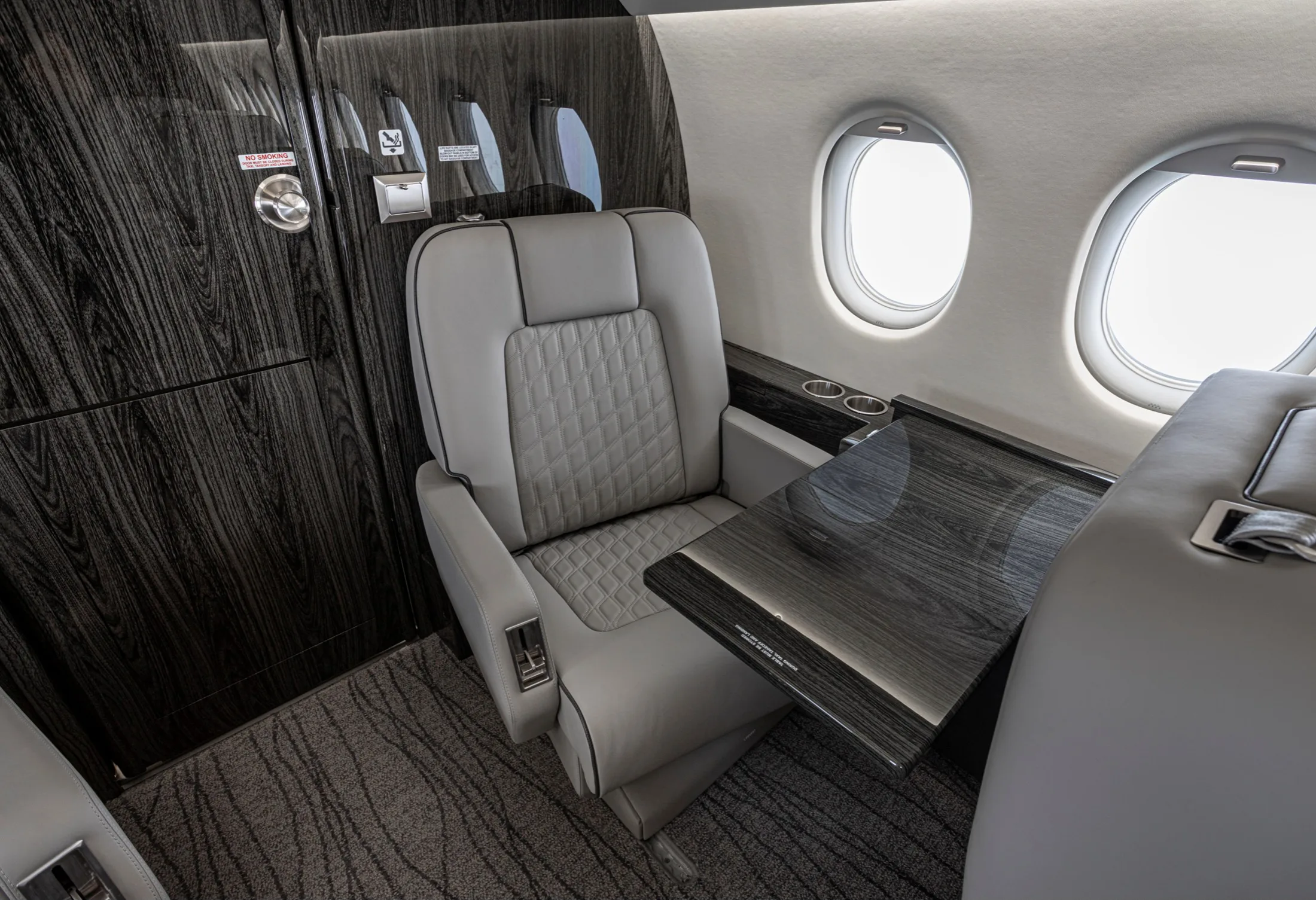 Cabin interior of a 1999 Dassault Falcon 2000.