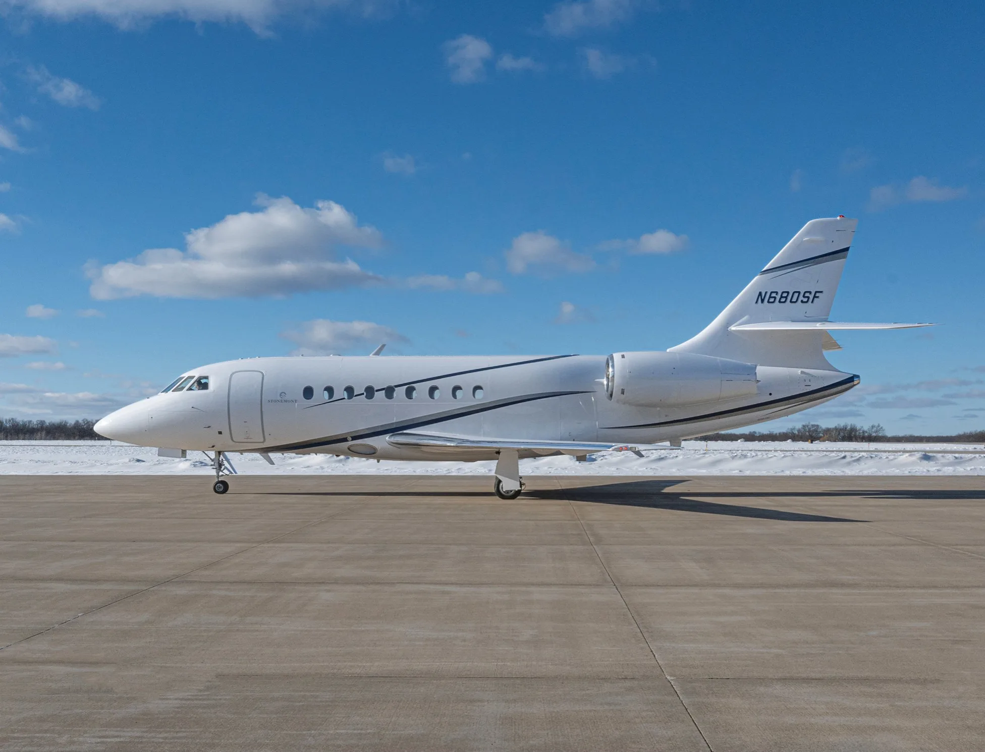 Marketing image of a 1999 Dassault Falcon 2000.