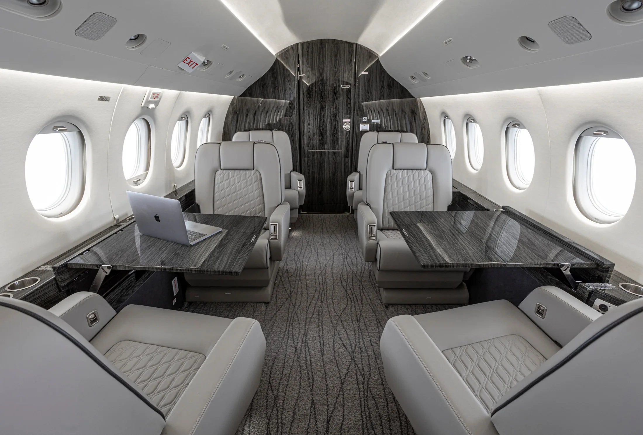 Cabin interior of a 1999 Dassault Falcon 2000.
