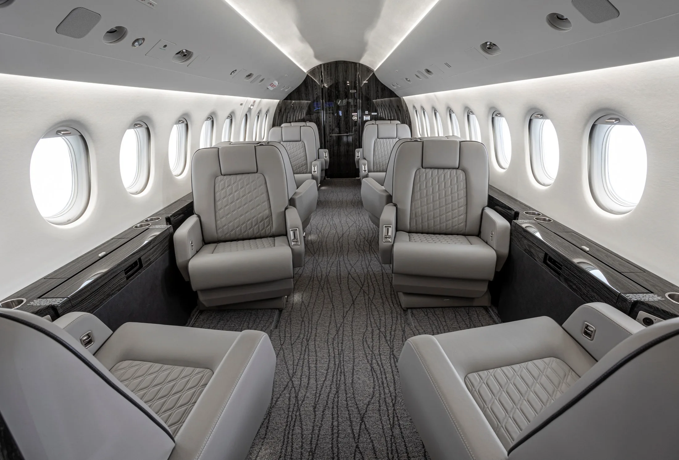 Cabin interior of a 1999 Dassault Falcon 2000.