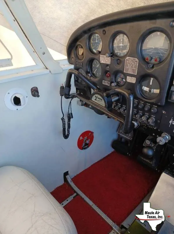 Cockpit and instrument panel of a 1965 Piper PA-28-140.