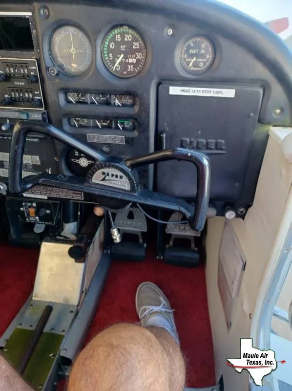 Cockpit and instrument panel of a 1965 Piper PA-28-140.