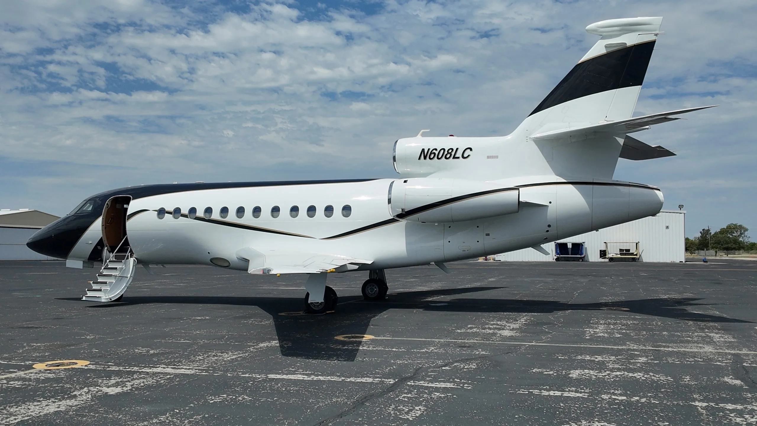 Exterior view of a 1997 Dassault Falcon 900EX, N608LC.