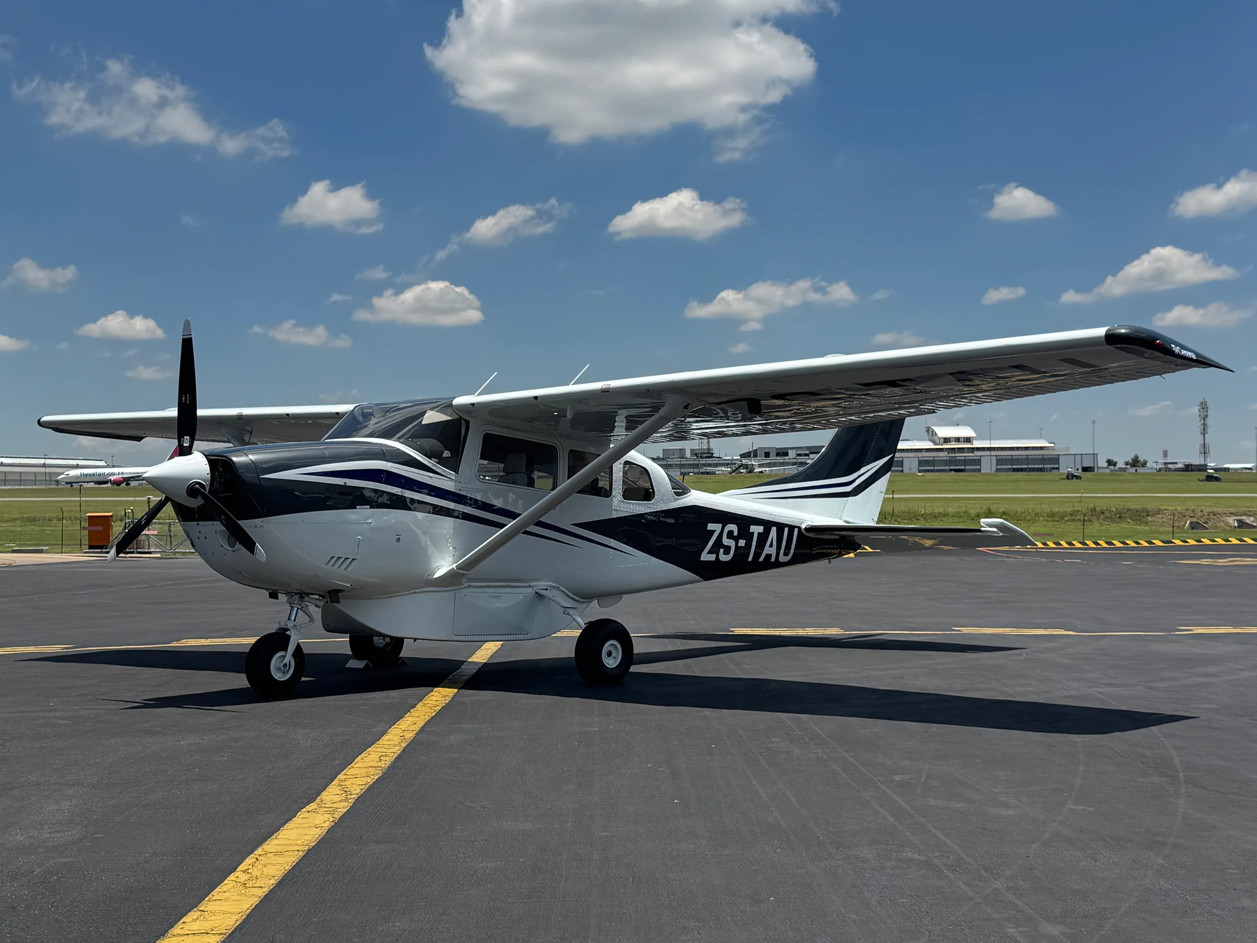 Exterior view of a 1972 Cessna U206, ZS-TAU.
