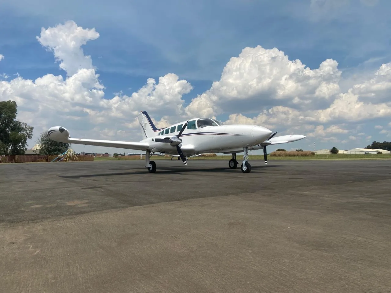 Exterior view of a 1978 Cessna 402B Businessliner II, ZS-MGY.